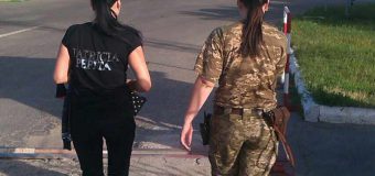 Un moldovean şi o ucraineancă, reţinuţi pentru activitate de mercenariat