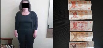 O femeie reținută pentru furt de portmoneu într-un troleibus din Capitală