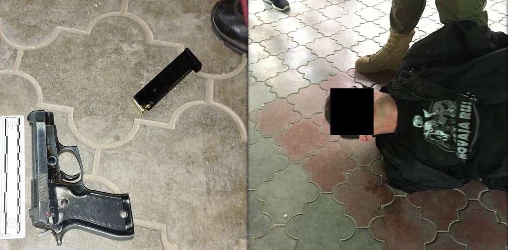 A intrat cu arma în magazin și a cerut băuturi alcoolice. Bărbatul încătușat de polițiști