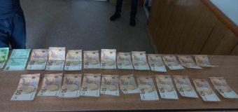 Un polițist – reținut în flagrant de CNA în momentul primirii unei mite de 1500 de euro