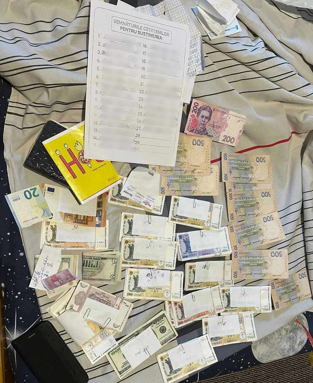 CNA efectuează percheziții în Chișinău, Orhei și sudul țării în dosare de finanțare ilegală a partidelor politice, spălare de bani și corupere electorală