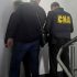Mita – 2 000 de euro: Un bărbat din Chișinău a fost reținut în flagrant de CNA și procurori pentru trafic de influență