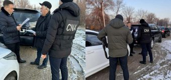 Două persoane – reținute de CNA într-un dosar de trafic de influență privind favorizarea promovării examenului auto