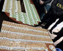 Patru persoane -reținute în flagrant pentru trafic de influență, după primirea unei mite de 40 mii euro