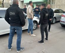 Un avocat stagiar din Chișinău, reținut în flagrant de CNA pentru trafic de influență