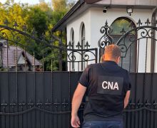 Un avocat, reținut de CNA și procurori într-un dosar de trafic de influență și escrocherie