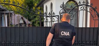 Un avocat, reținut de CNA și procurori într-un dosar de trafic de influență și escrocherie